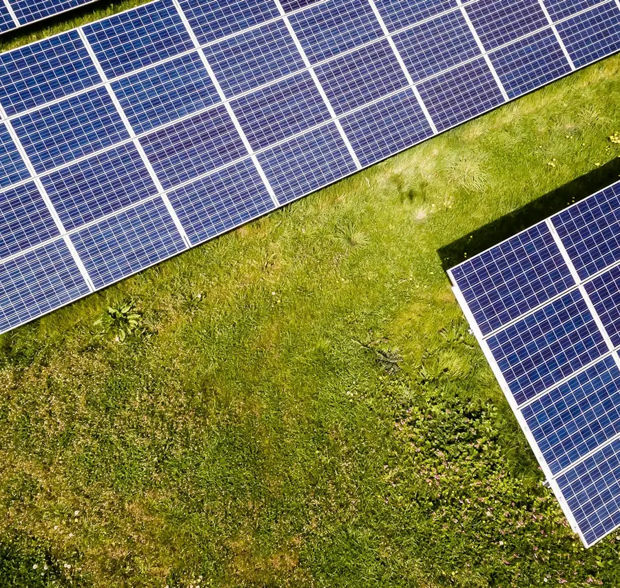 Solar engineer installing panels on a residential rooftop